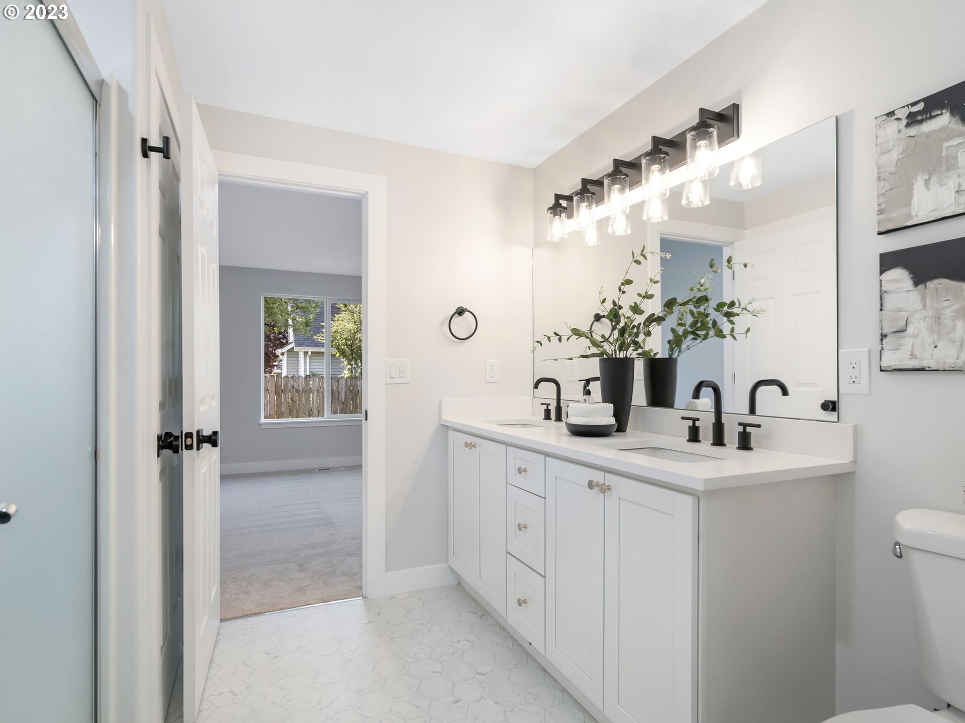 15268 Penny Avenue Sandy, OR 97055 - Photo 23 of 35 a bathroom with a double vanity sink mirror and shower