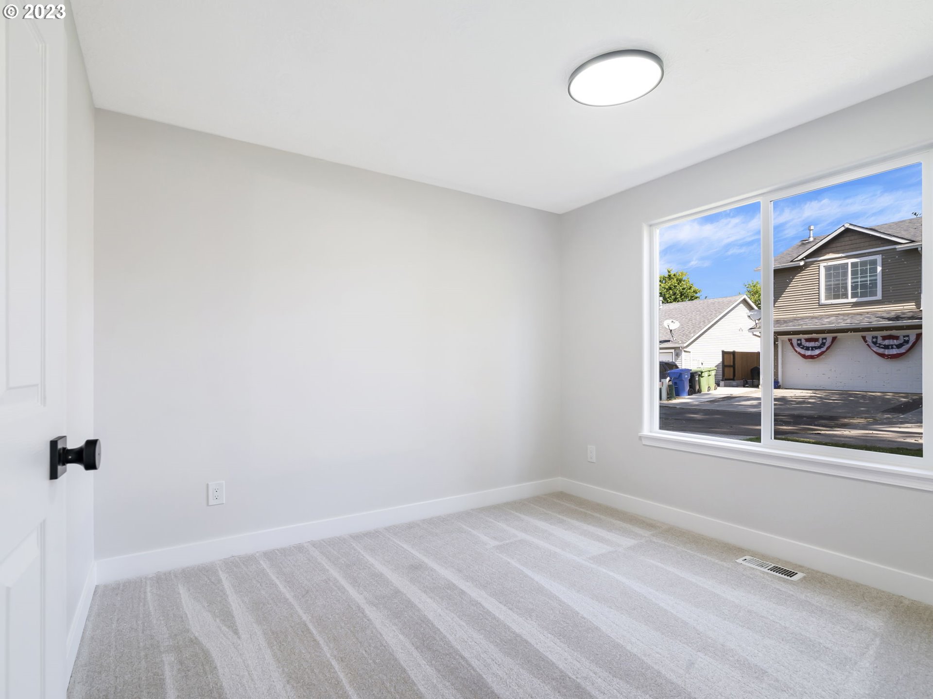 15268 Penny Avenue Sandy, OR 97055 - Photo 25 of 35 a view of a livingroom with an empty space and a window