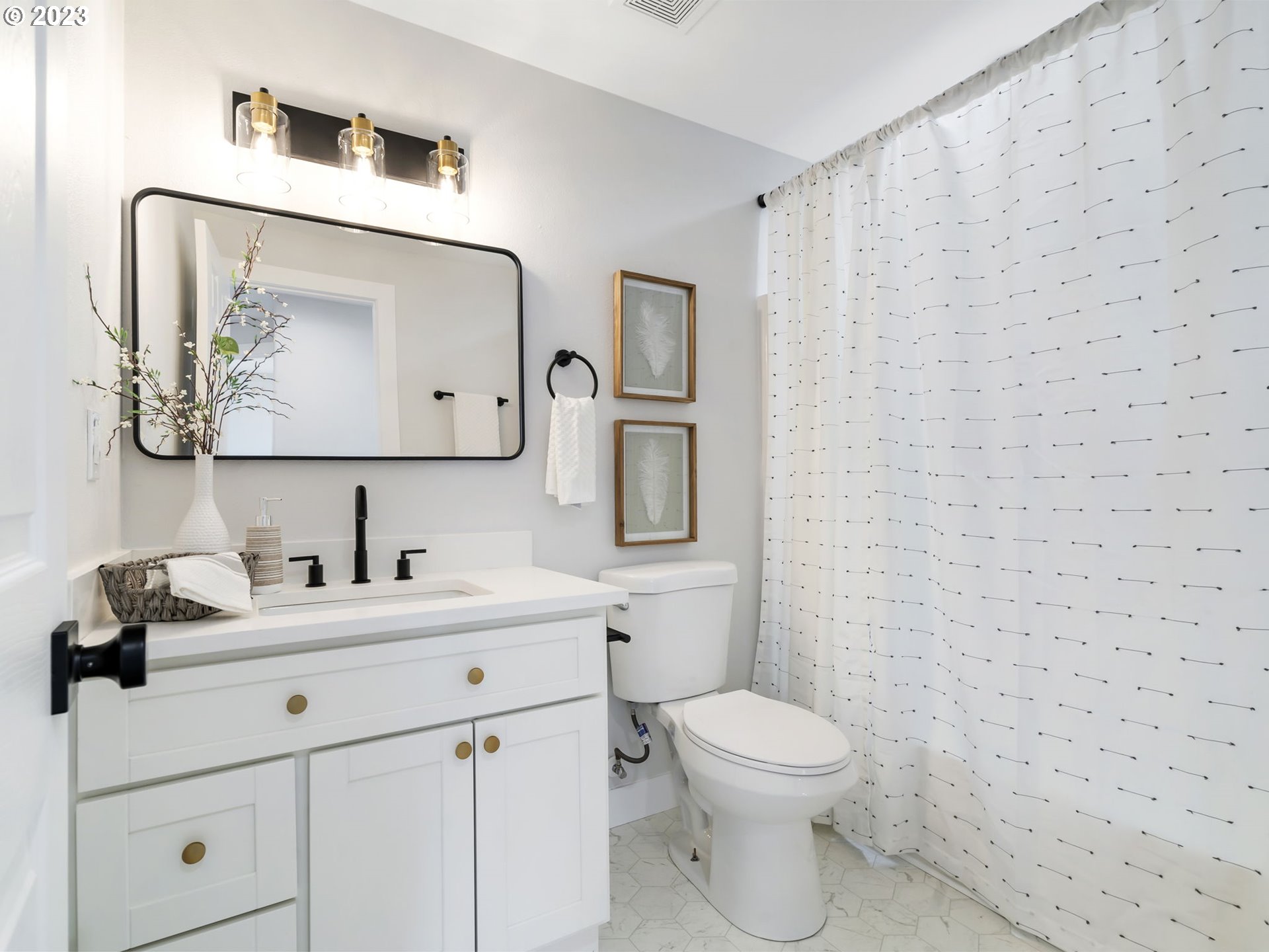 15268 Penny Avenue Sandy, OR 97055 - Photo 27 of 35 a bathroom with a toilet a sink a mirror a vanity and mirror