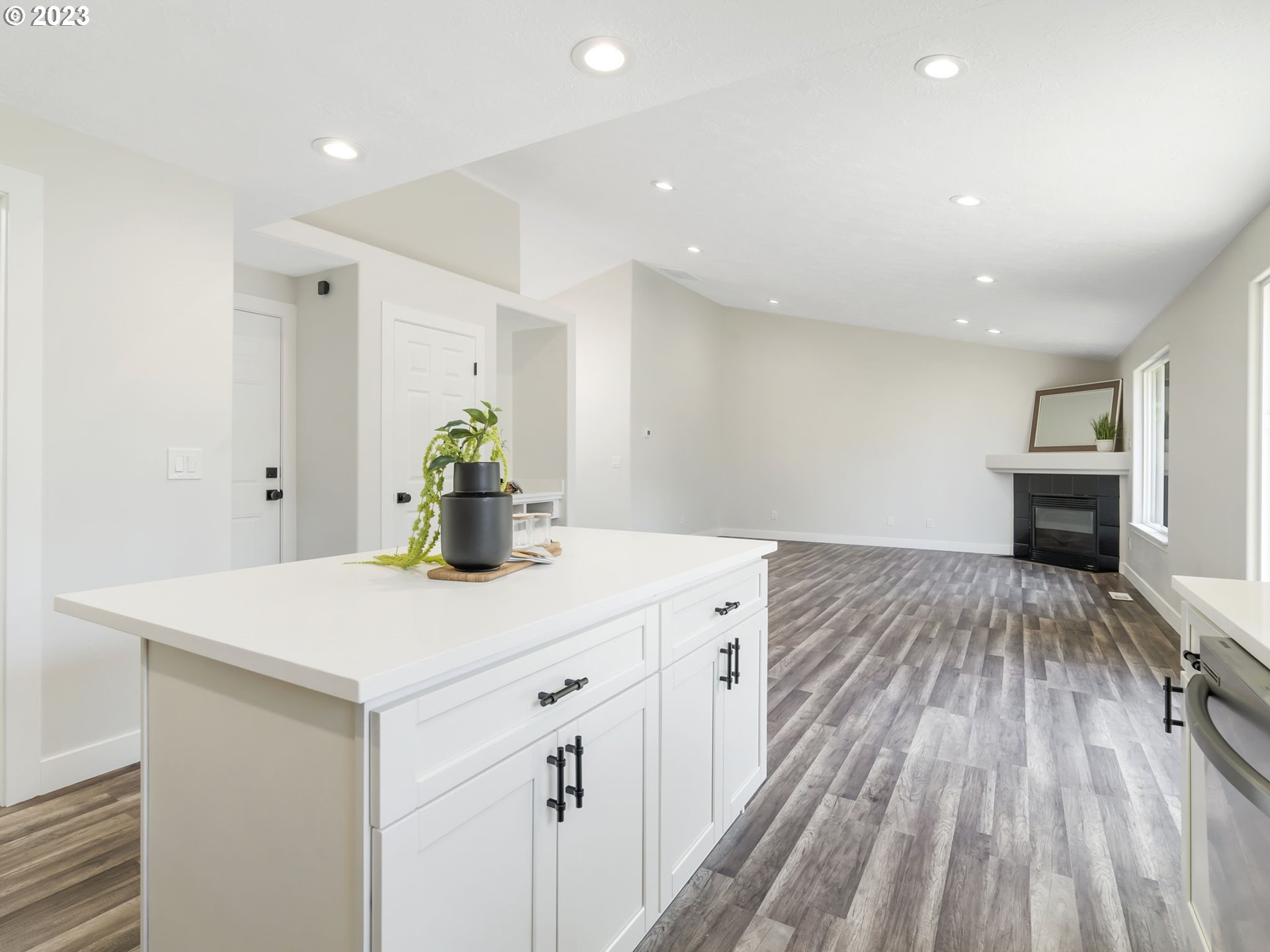 15268 Penny Avenue Sandy, OR 97055 - Photo 9 of 35 a kitchen with a sink and wooden floor