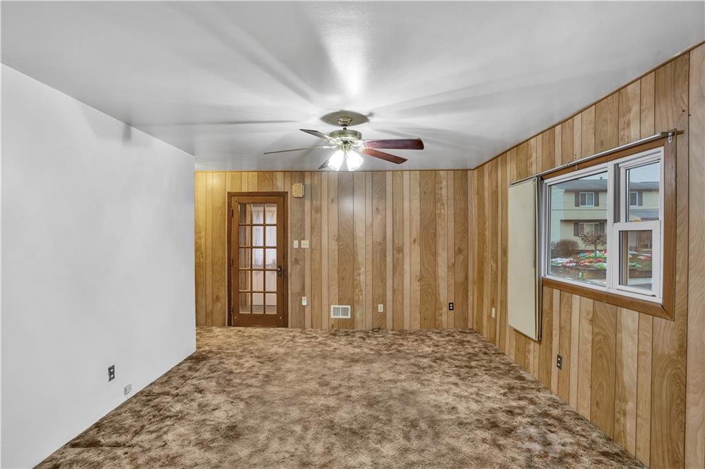 520 6th Avenue Carnegie, PA 15106 - Photo 5 of 25 wooden floor in an empty room with a window