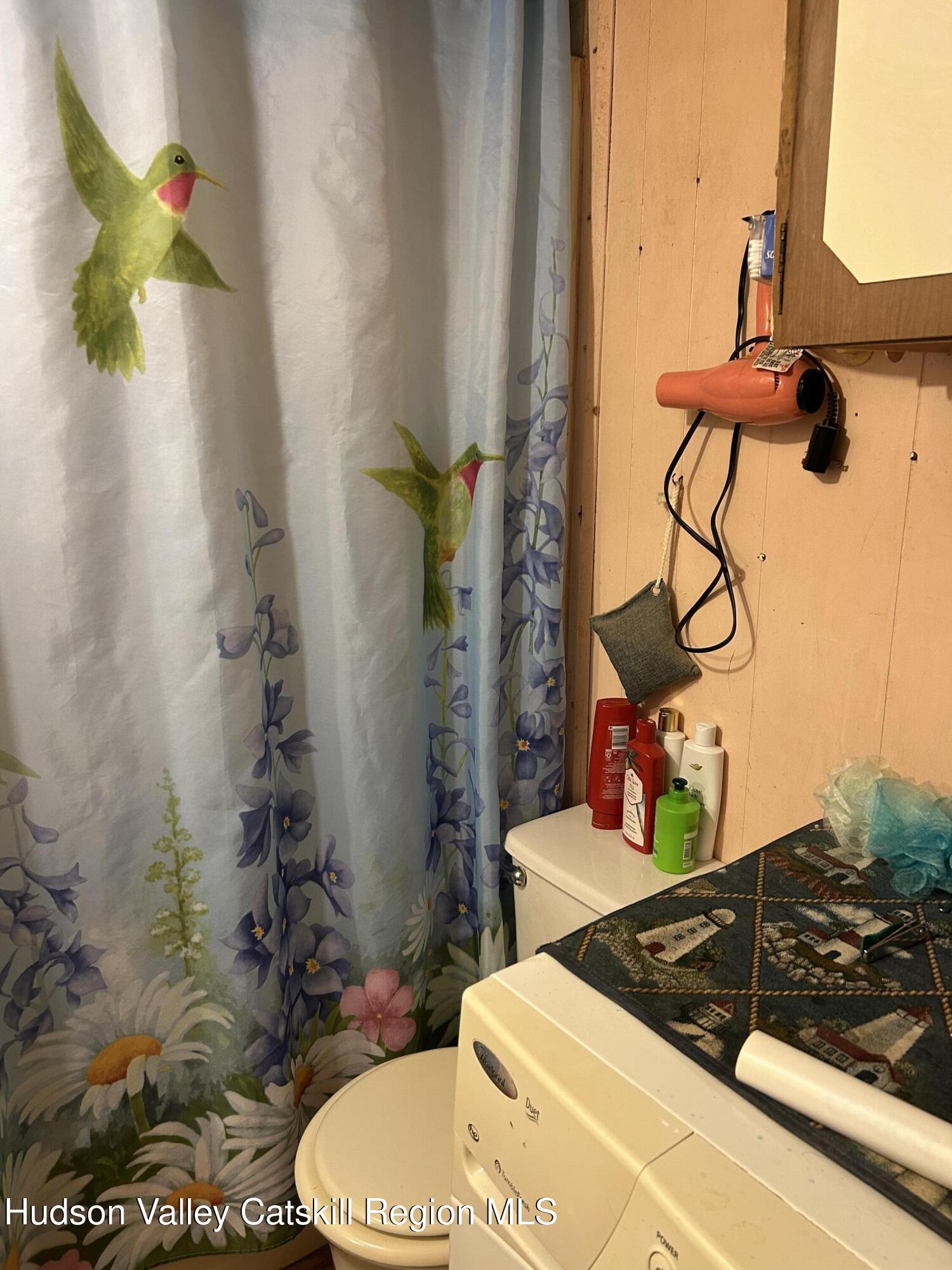 411 Plattekill Road Marlboro, NY 12542 - Photo 24 of 26 a bathroom with a sink toilet and shower