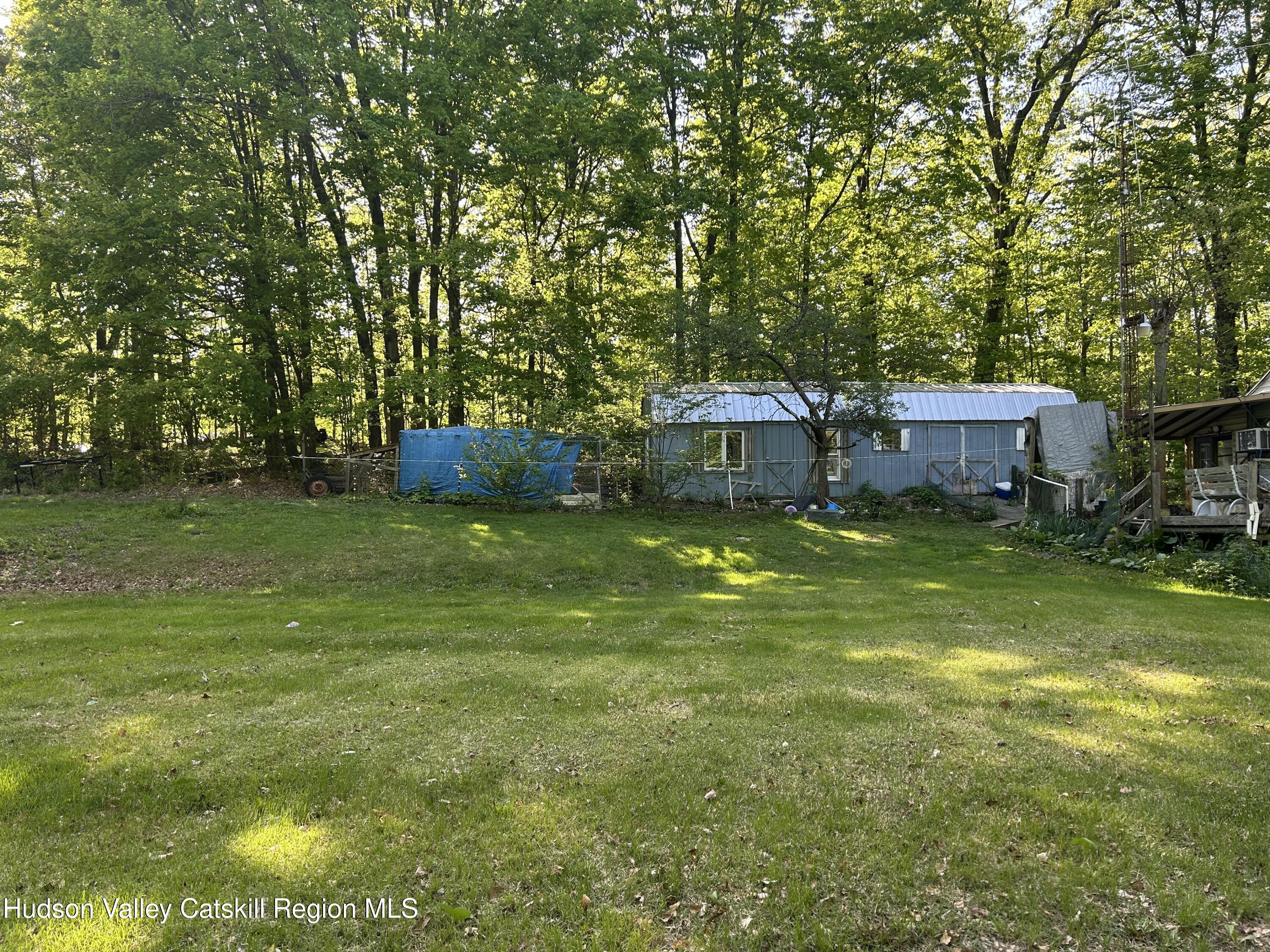 411 Plattekill Road Marlboro, NY 12542 - Photo 4 of 26 a view of a house with a big yard