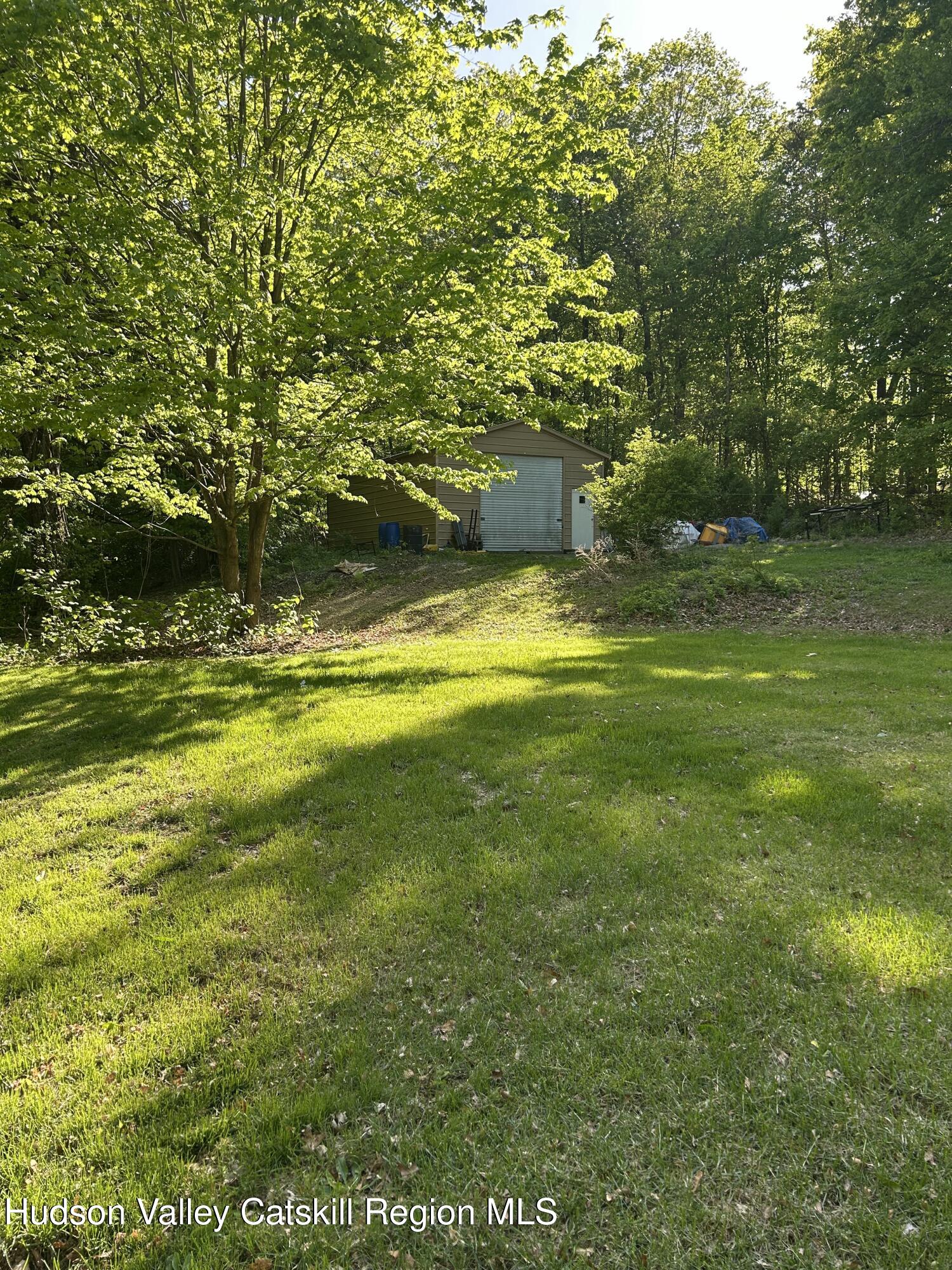 411 Plattekill Road Marlboro, NY 12542 - Photo 5 of 26 a view of an outdoor space and swimming pool