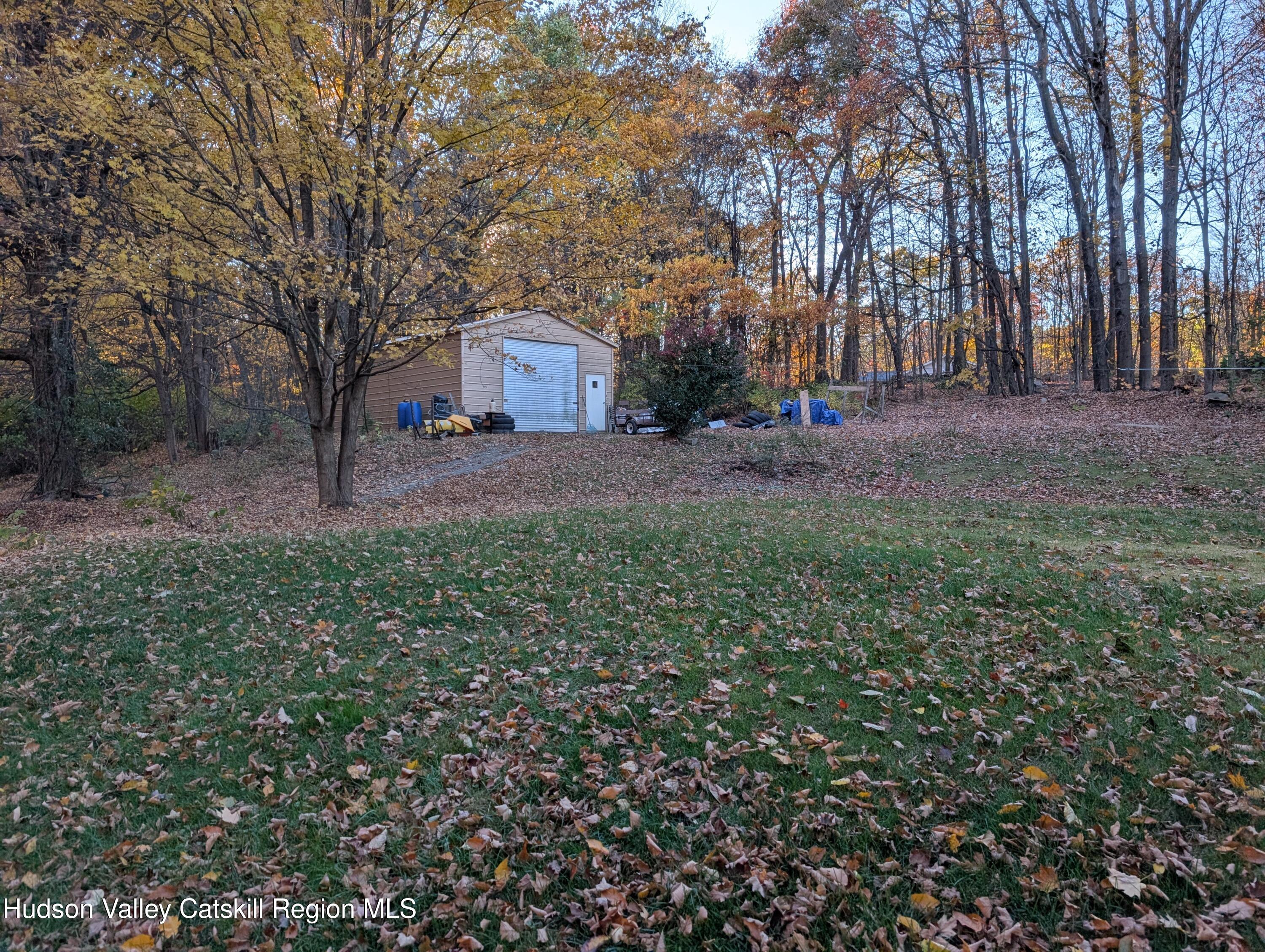 411 Plattekill Road Marlboro, NY 12542 - Photo 6 of 26 a front view of a house with a yard