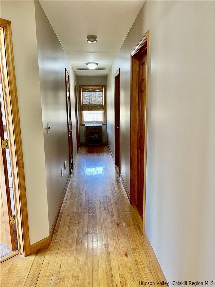 3 Knolls Road, Unit 1 Wallkill, NY 12589 - Photo 17 of 33 a view of gallery with wooden floor