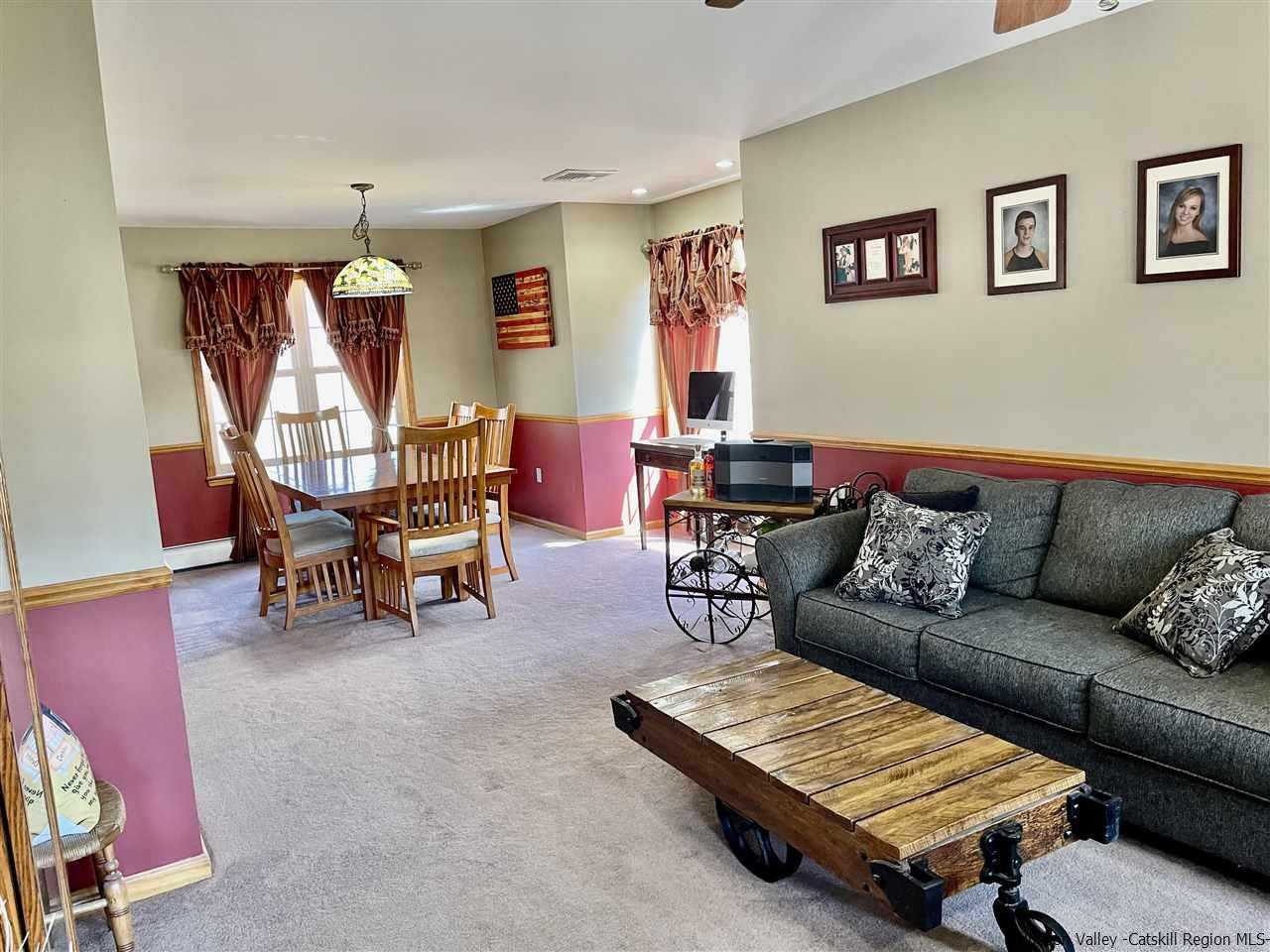 3 Knolls Road, Unit 1 Wallkill, NY 12589 - Photo 10 of 33 a living room with furniture and a wooden floor