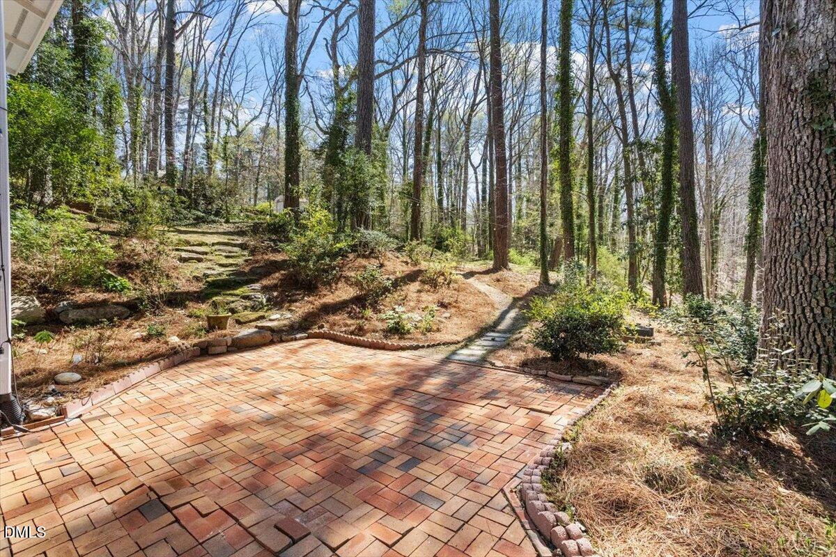 4805 Rembert Drive Raleigh, NC 27612 - Photo 44 of 45 a view of a backyard of the house