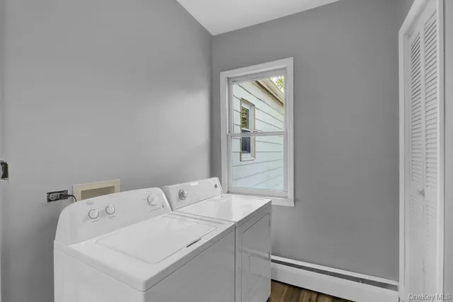 a utility room with dryer and washer
