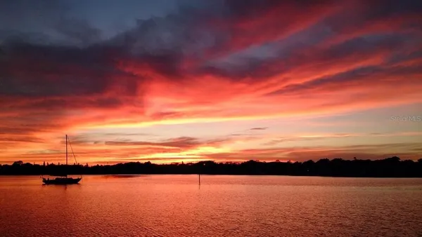 a view of lake and sunset