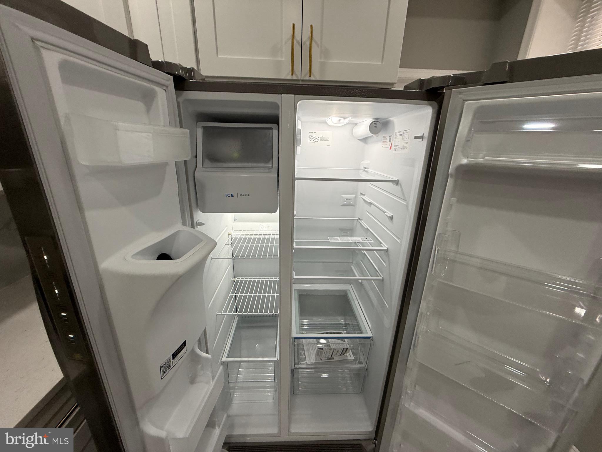 2122 West Toronto Street Philadelphia, PA 19132 - Photo 31 of 112 INSIDE OPF FRIG