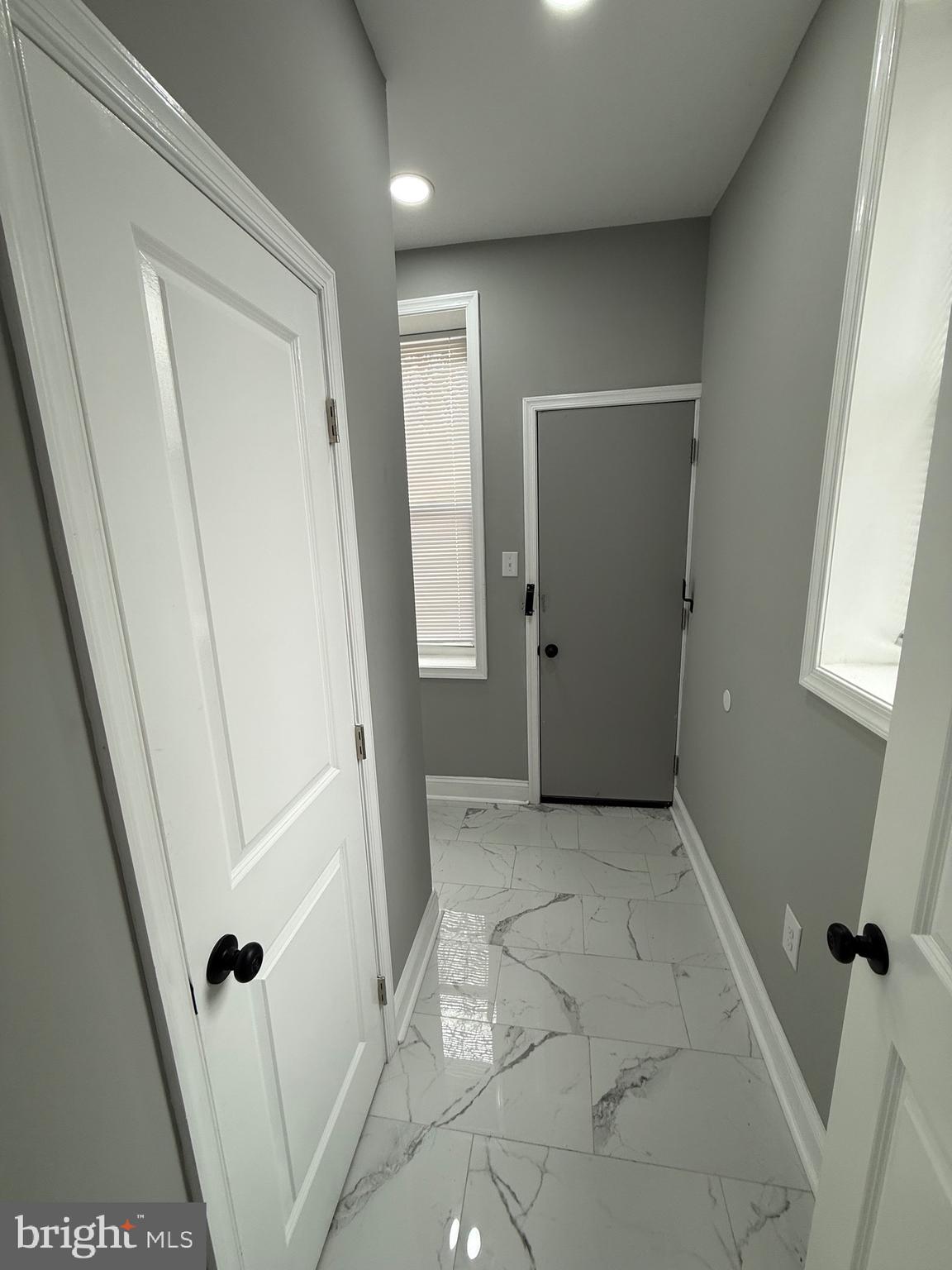 2122 West Toronto Street Philadelphia, PA 19132 - Photo 32 of 112 HALL TO BACK YARD , BASEMENT & 1ST FLR HALF BATH