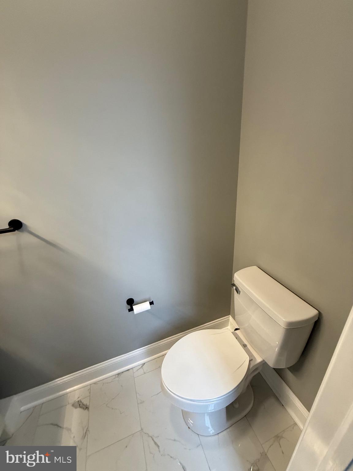 2122 West Toronto Street Philadelphia, PA 19132 - Photo 34 of 112 a white toilet sitting next to a shower