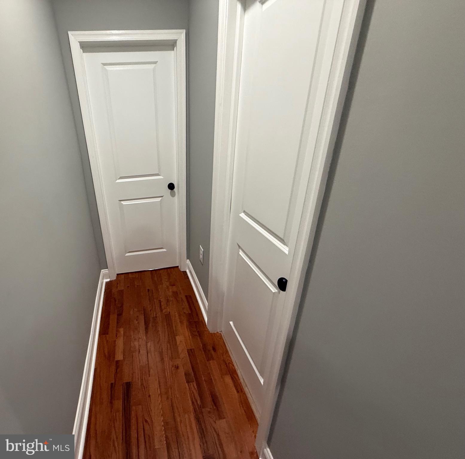 2122 West Toronto Street Philadelphia, PA 19132 - Photo 39 of 112 a view of a hallway view with wooden floor and staircase