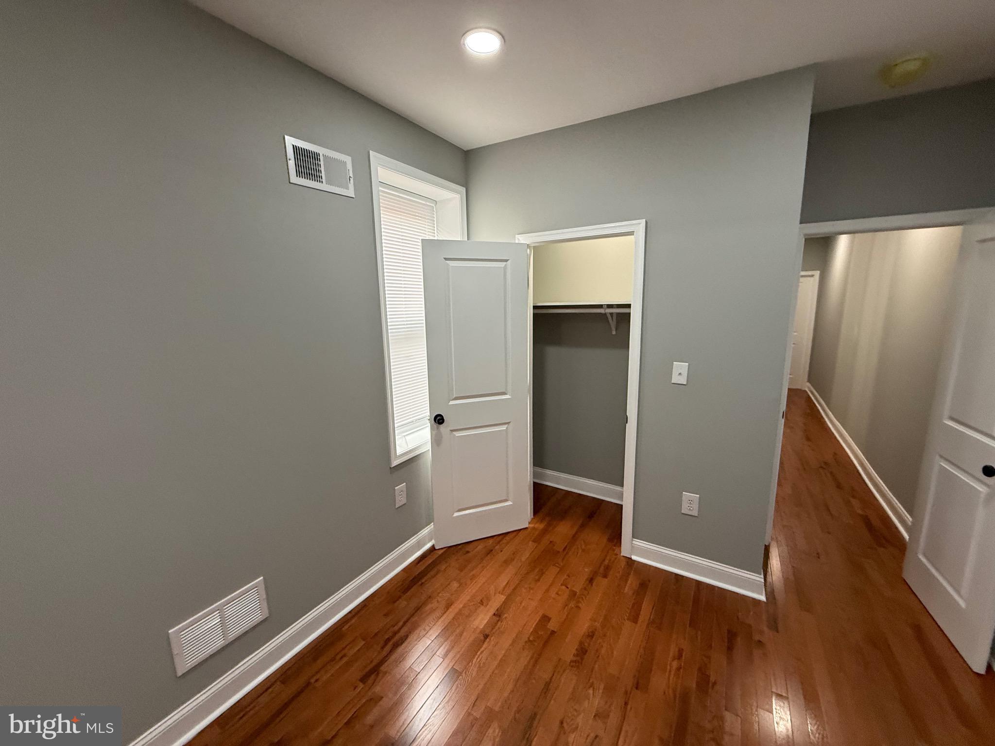 2122 West Toronto Street Philadelphia, PA 19132 - Photo 48 of 112 a view of empty room with wooden floor