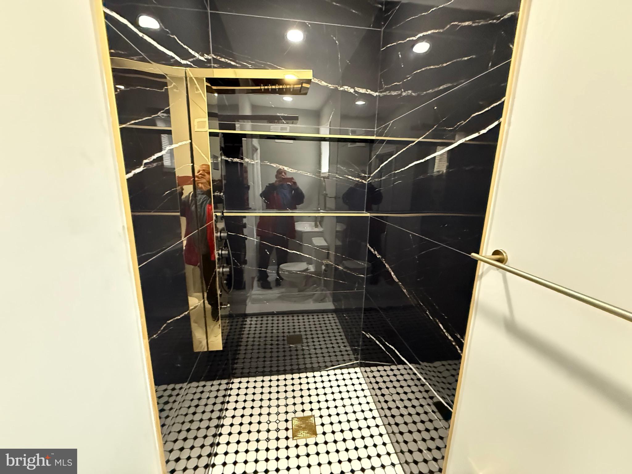 2122 West Toronto Street Philadelphia, PA 19132 - Photo 60 of 112 a walk in closet with wooden floor