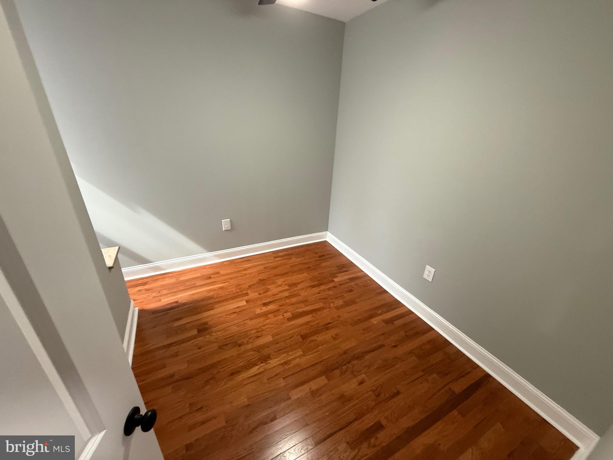 2122 West Toronto Street Philadelphia, PA 19132 - Photo 82 of 112 a view of empty room with wooden floor