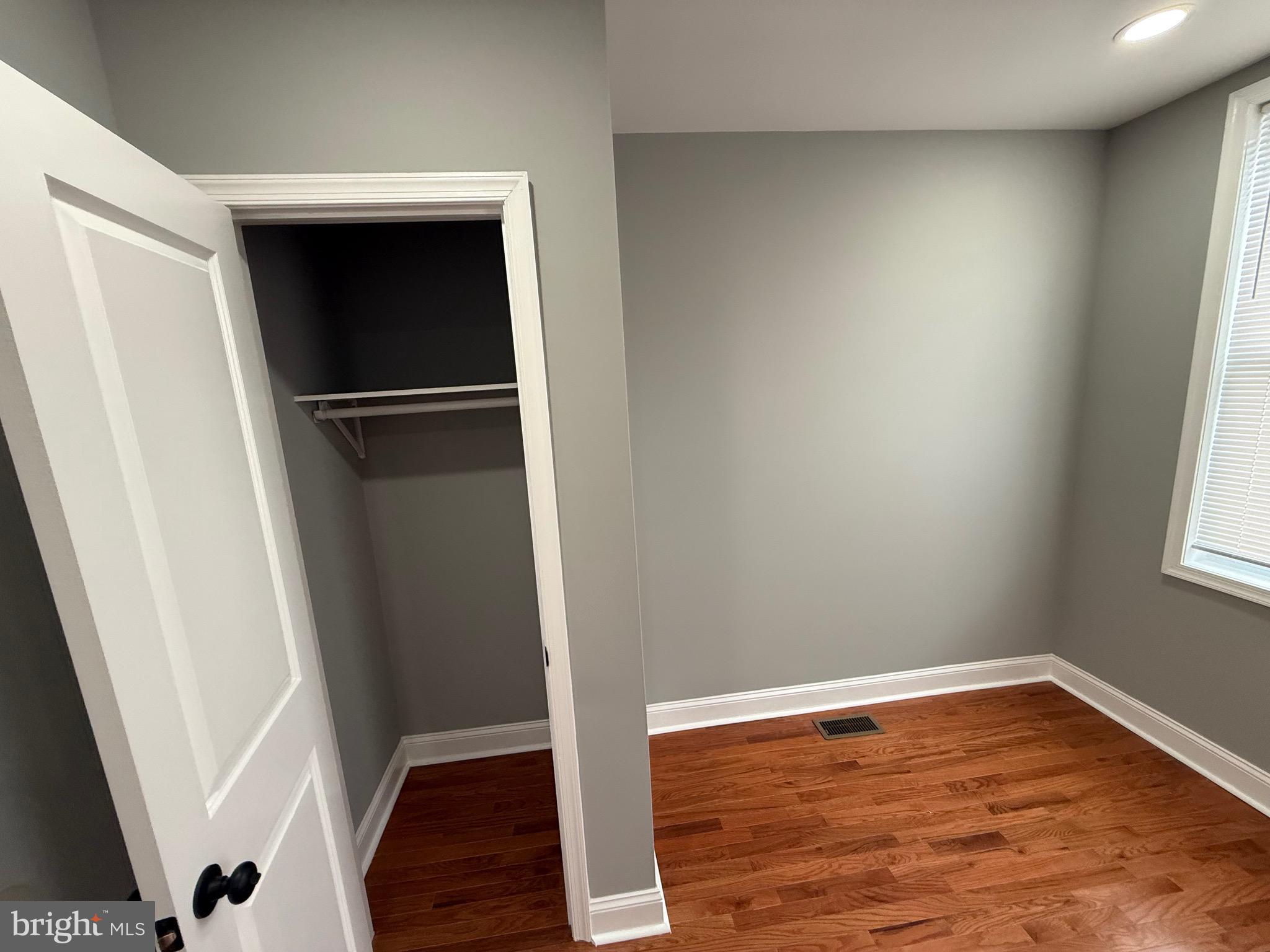 2122 West Toronto Street Philadelphia, PA 19132 - Photo 89 of 112 a view of walk in closet with wooden floor
