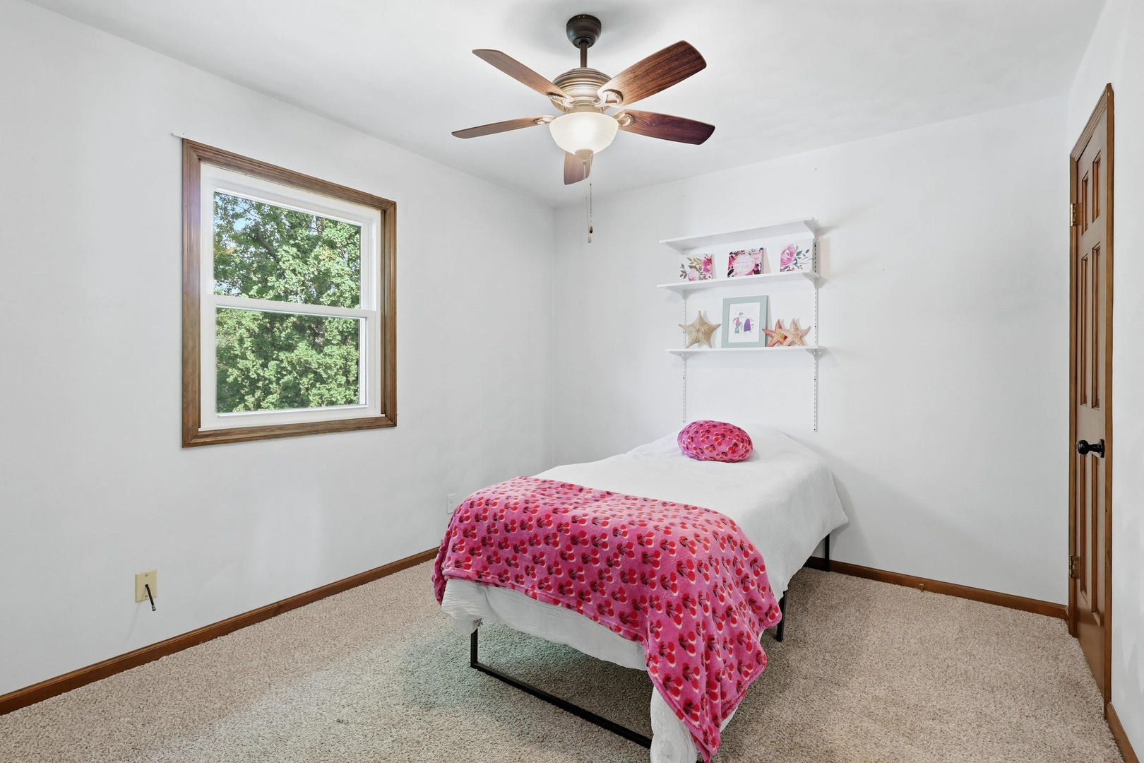 4314 Spring Street Davenport, IA 52807 - Photo 39 of 51 a bedroom with a bed and a window