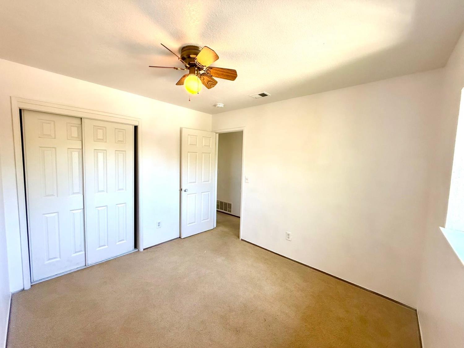 80 East Portola Way, Unit 105 Tracy, CA 95376 - Photo 6 of 12 a view of an empty room