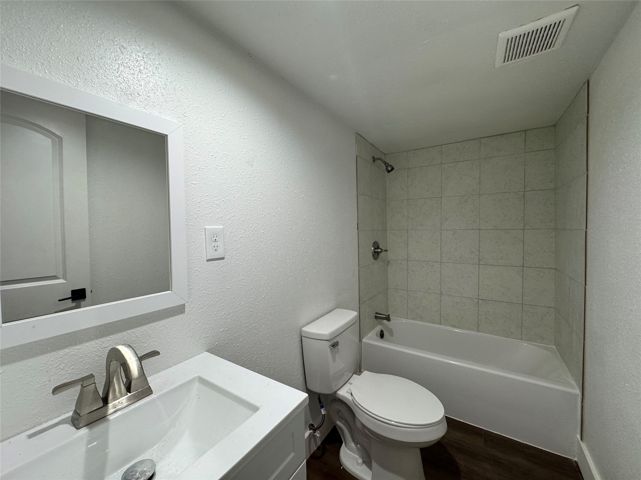 19307 Timberland Boulevard Porter, TX 77365 - Photo 5 of 9 a bathroom with a sink a toilet and shower