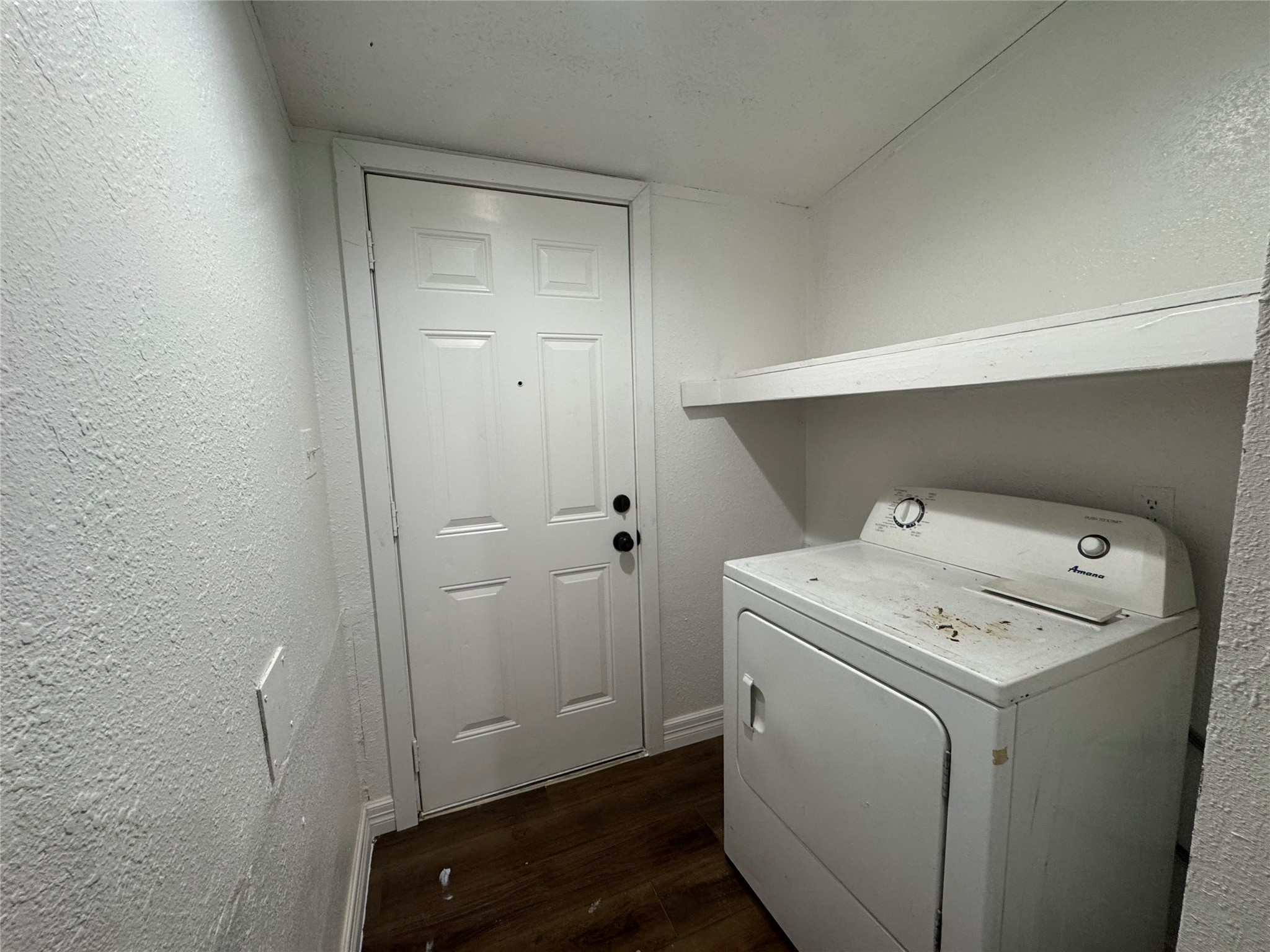 19307 Timberland Boulevard Porter, TX 77365 - Photo 9 of 9 a utility room with dryer and washer