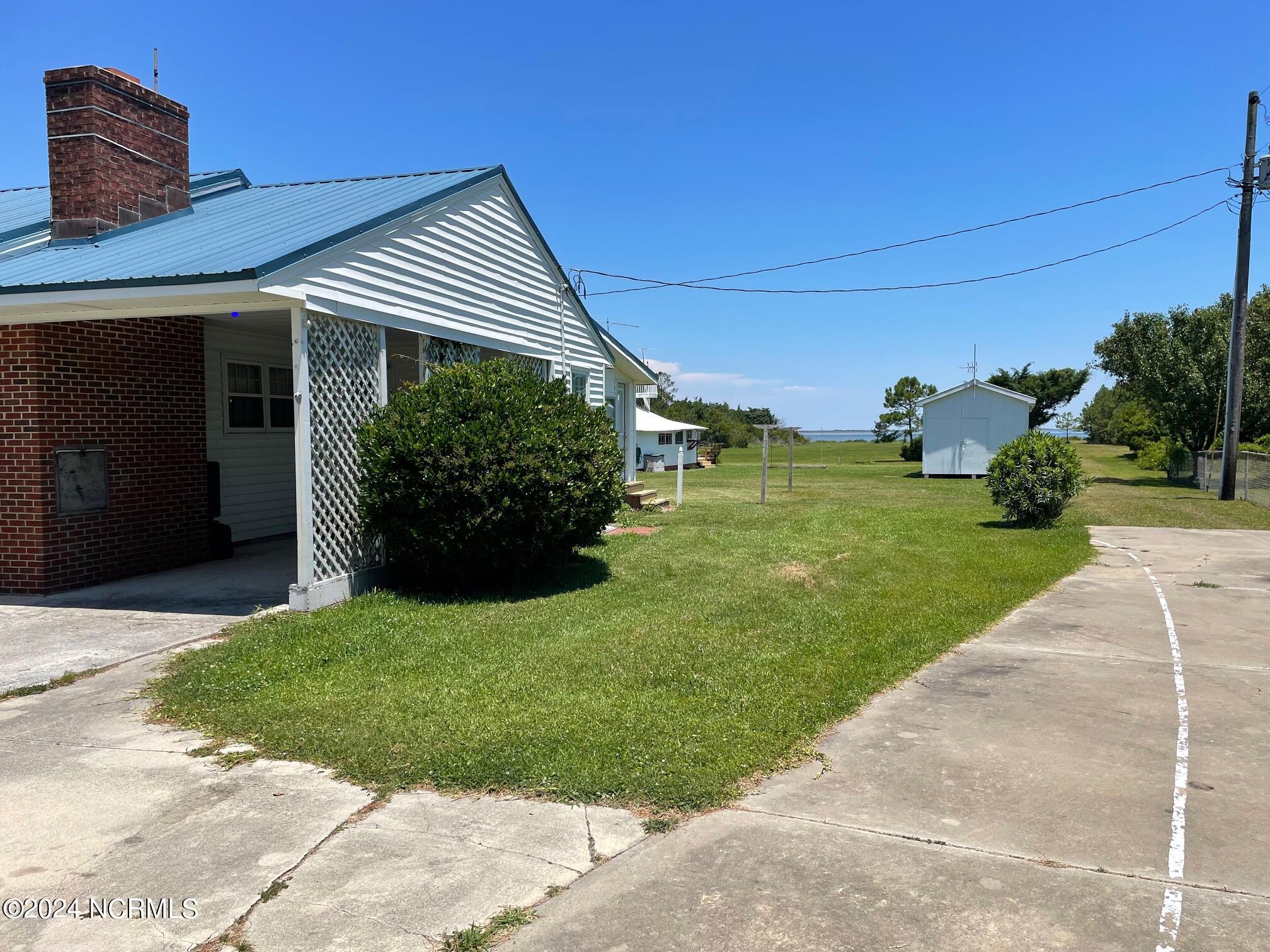 2604 Cedar Island Road Cedar Island, NC 28520 - Photo 12 of 62 Hard surface to studio and barn