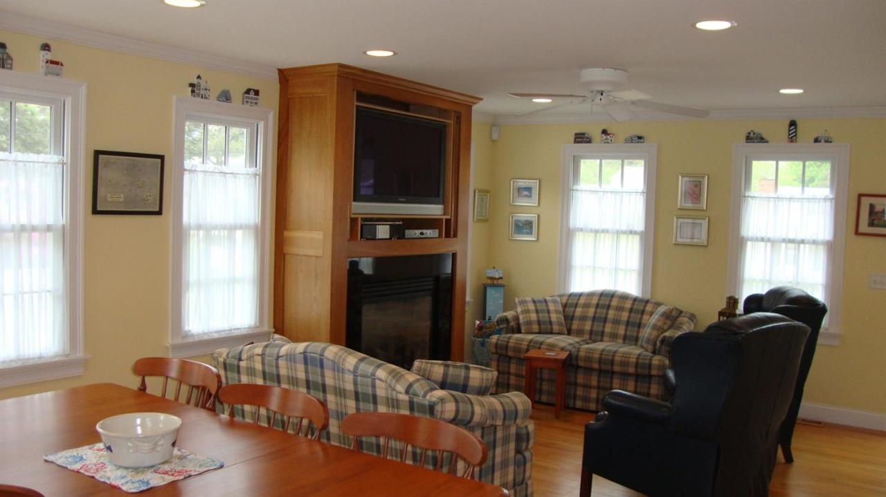 44 Longell Road Dennis Port, MA 02639 - Photo 14 of 35 a living room with furniture and a window