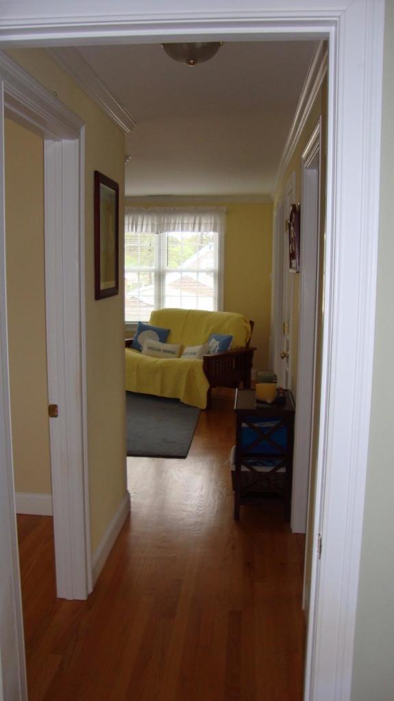 44 Longell Road Dennis Port, MA 02639 - Photo 28 of 35 a living room with furniture window and wooden floor