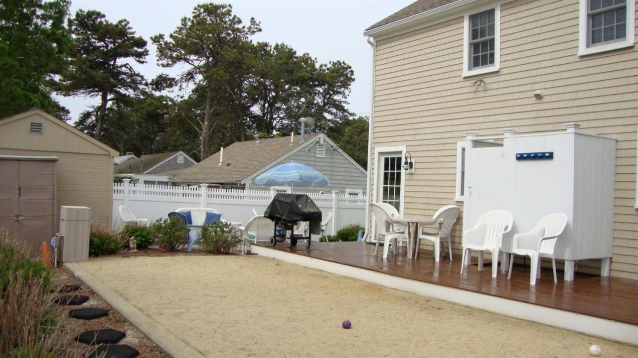 44 Longell Road Dennis Port, MA 02639 - Photo 9 of 35 a view of a house with wooden deck