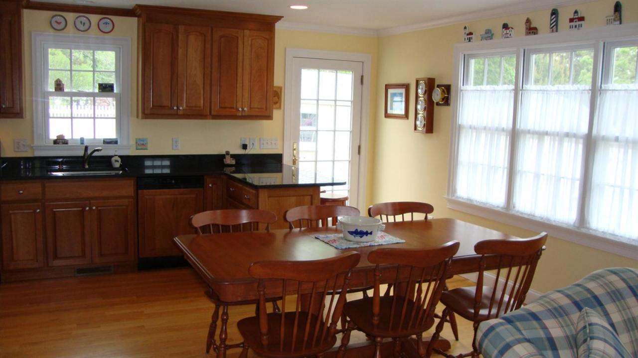 44 Longell Road Dennis Port, MA 02639 - Photo 10 of 35 a dining room with furniture and window