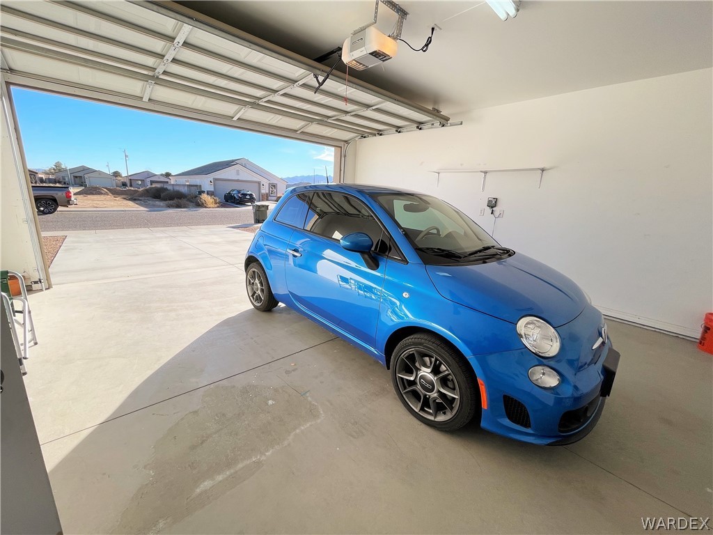 3605 North Kenneth Road Kingman, AZ 86409 - Photo 24 of 28 a view of a car in a garage