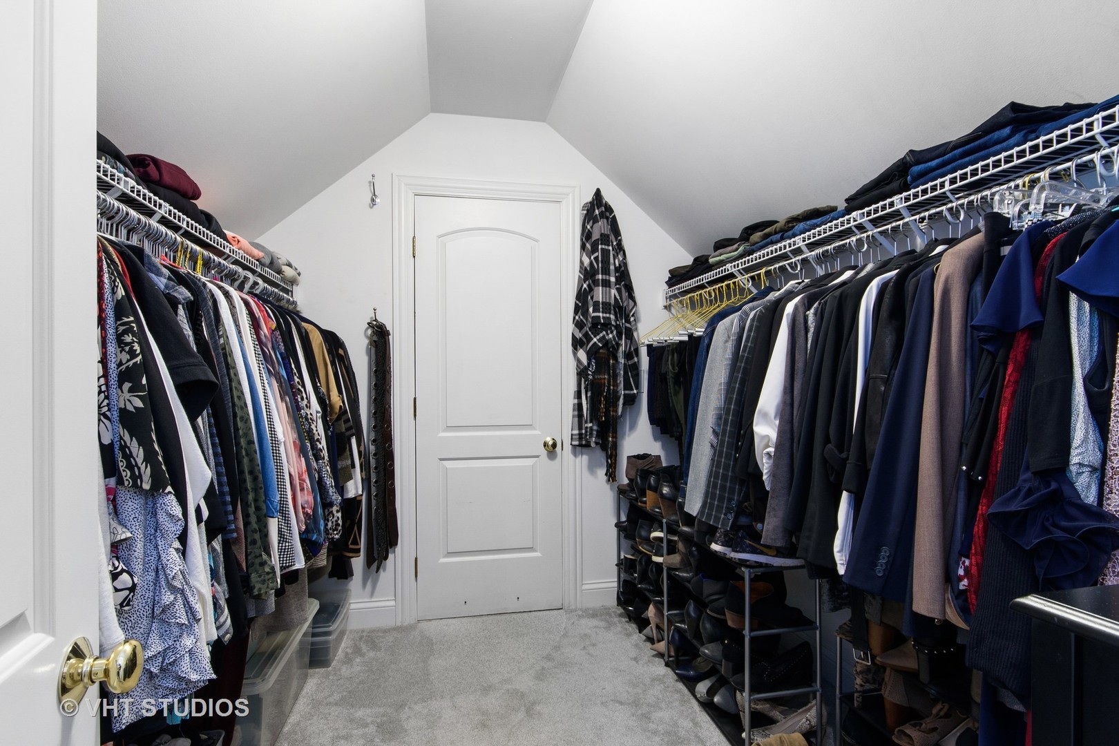 975 Prairie Hill Court Cary, IL 60013 - Photo 12 of 32 a view of walk in closet with clothes and shoes