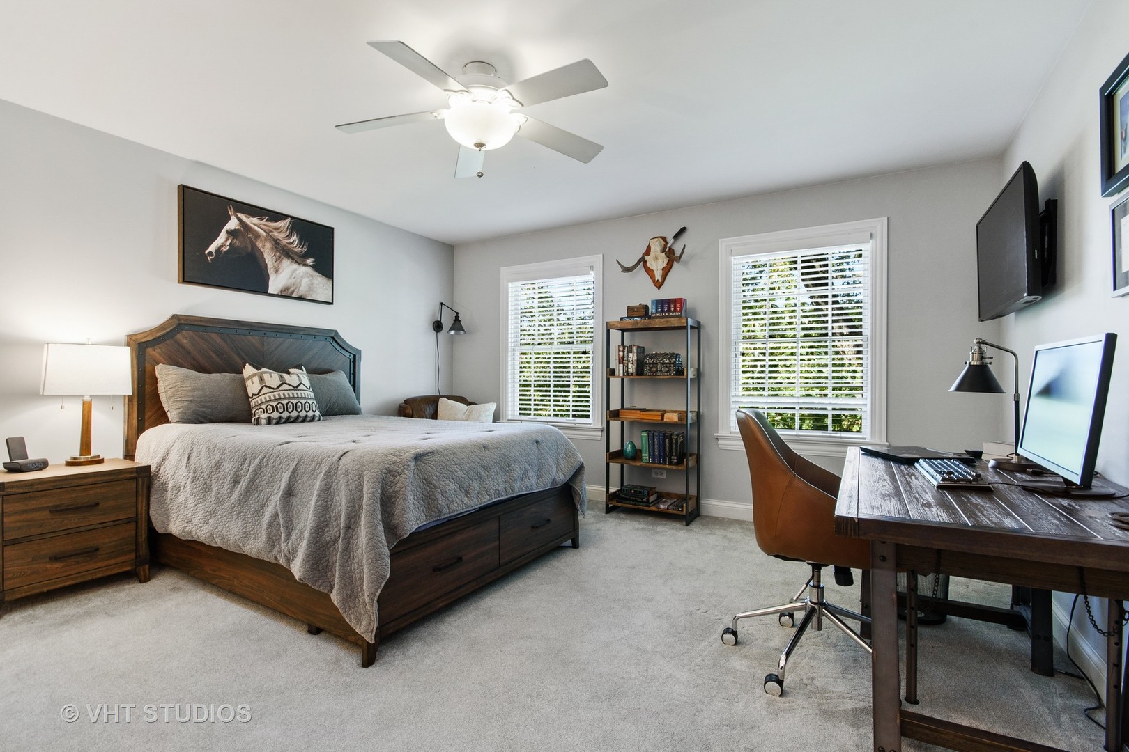 975 Prairie Hill Court Cary, IL 60013 - Photo 15 of 32 a spacious bedroom with a bed a computer on the desk and a chair