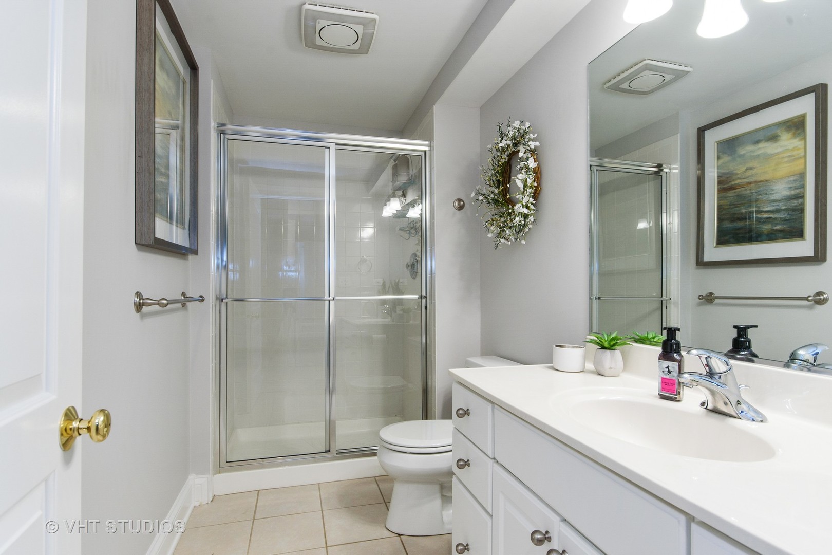975 Prairie Hill Court Cary, IL 60013 - Photo 17 of 32 a bathroom with a sink toilet and shower