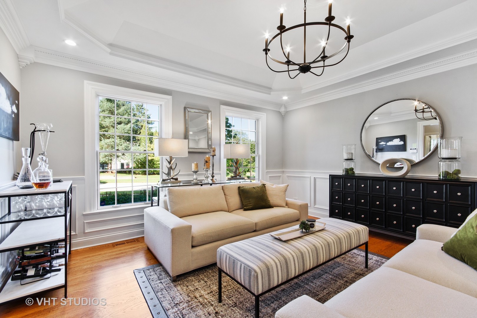 975 Prairie Hill Court Cary, IL 60013 - Photo 3 of 32 a living room with furniture a large window and a chandelier