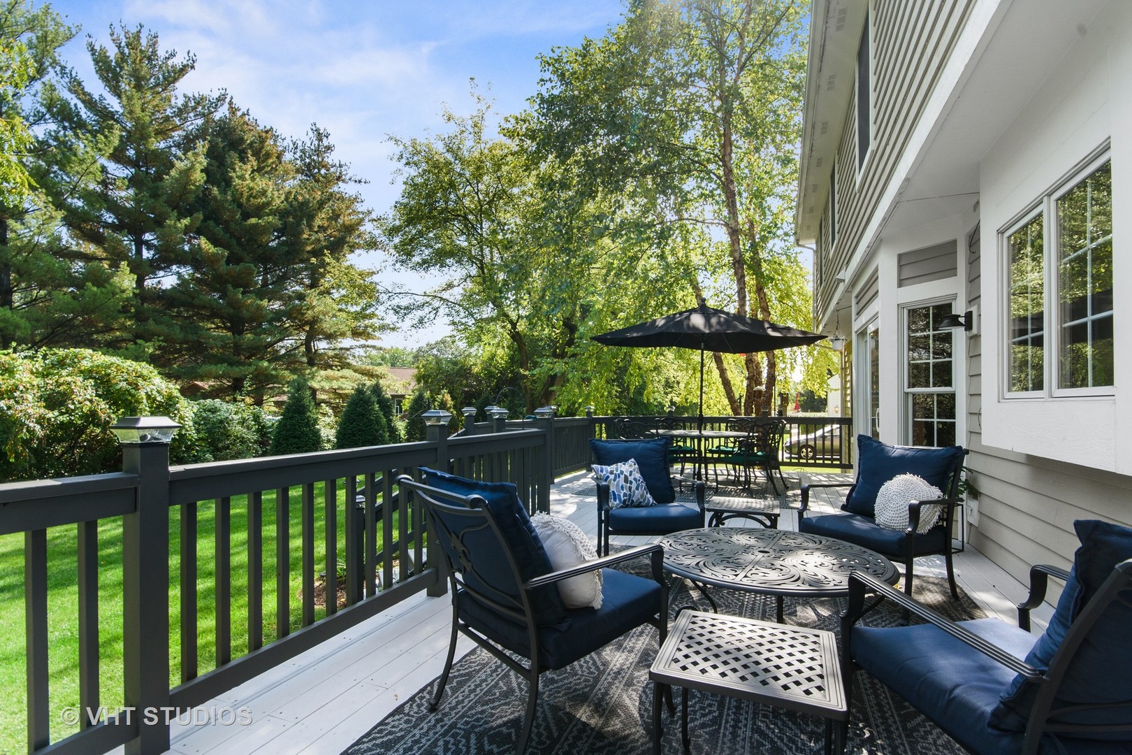 975 Prairie Hill Court Cary, IL 60013 - Photo 25 of 32 a view of a patio with couches table and chairs and potted plants
