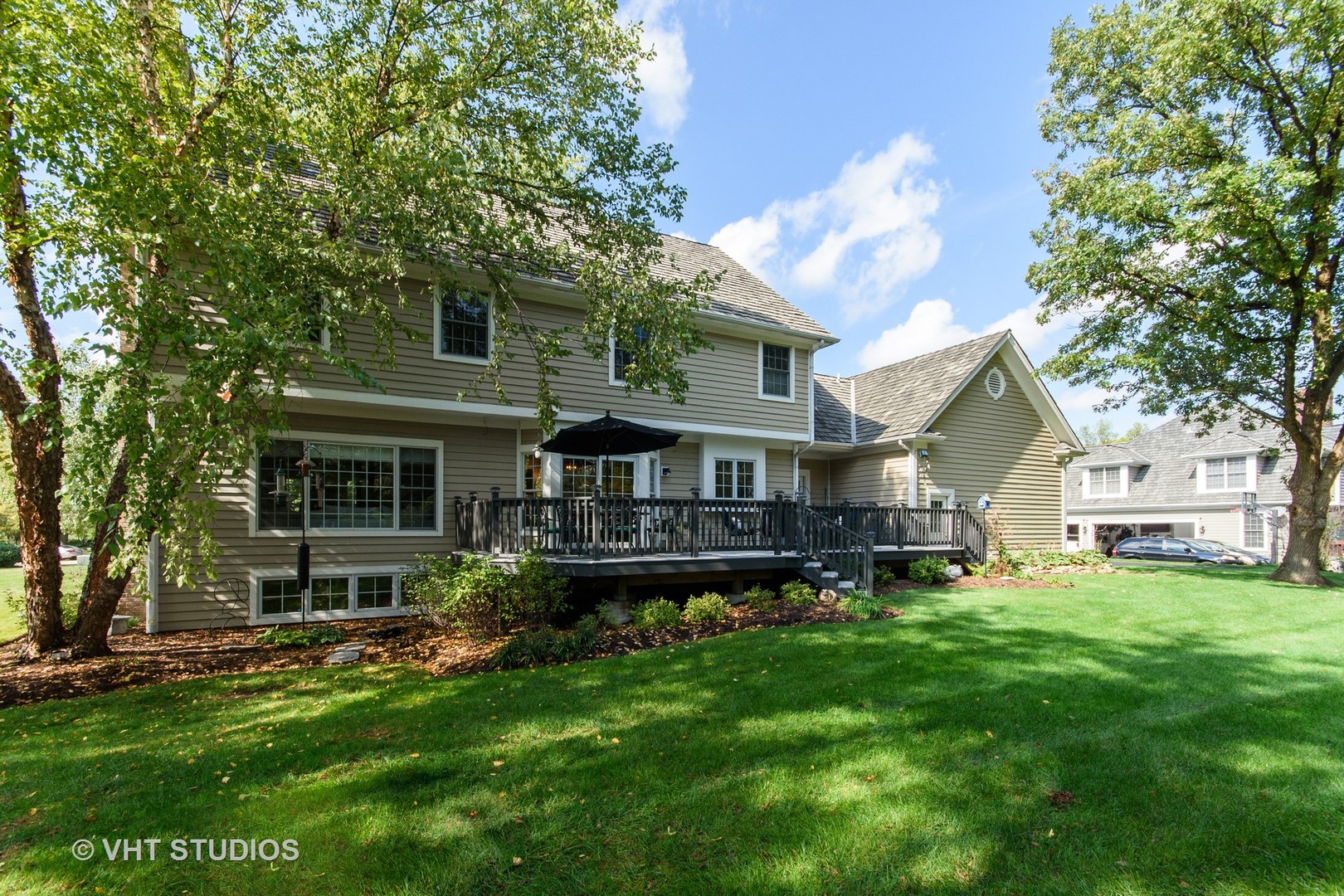 975 Prairie Hill Court Cary, IL 60013 - Photo 28 of 32 a view of a house with a yard porch and sitting area