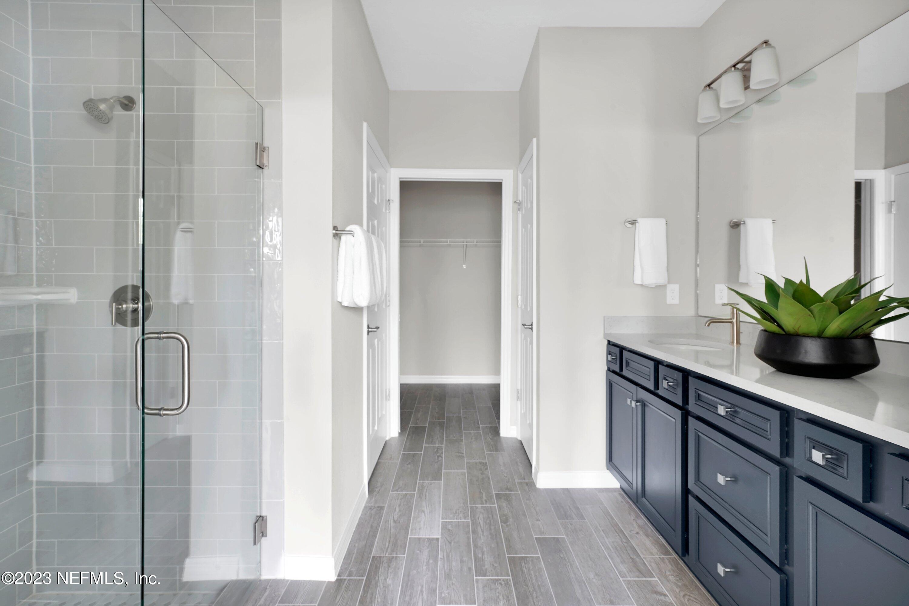 548 Jubilee Circle Yulee, FL 32097 - Photo 11 of 14 a view of a bathroom from a hallway