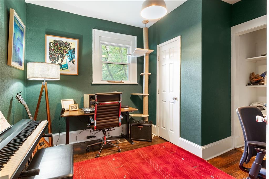 1010 Dill Avenue Southwest Atlanta, GA 30310 - Photo 18 of 39 a view of a workspace with furniture and a window