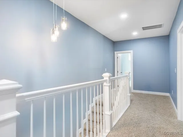 a view of hallway with stairs