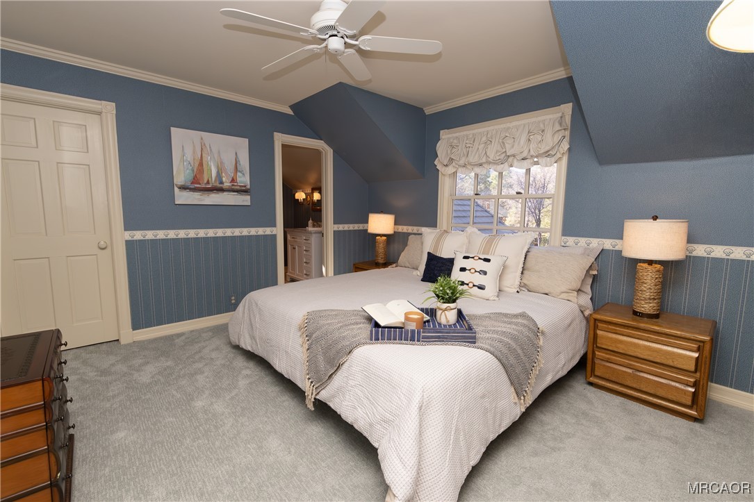 1660 Cascade Road Big Bear City, CA 92314 - Photo 16 of 42 a bedroom with a bed and window