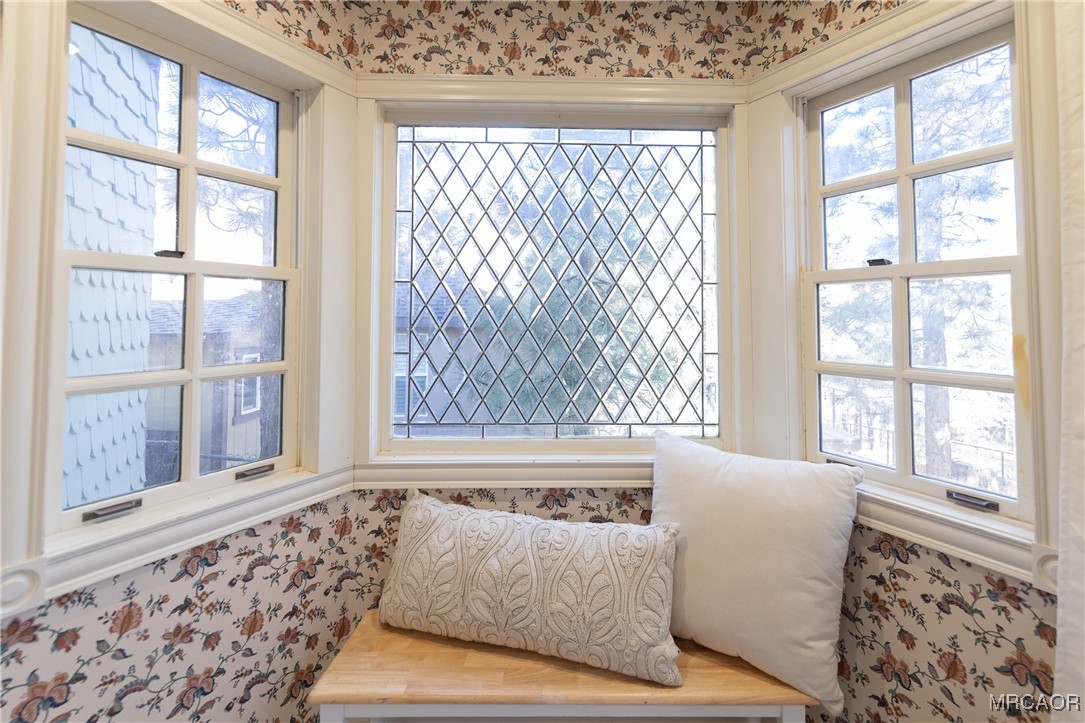 1660 Cascade Road Big Bear City, CA 92314 - Photo 27 of 42 a living room with couch and a window