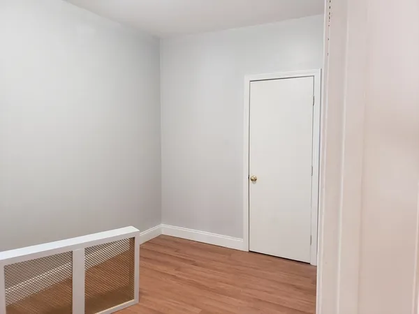 a view of small space with wooden floor