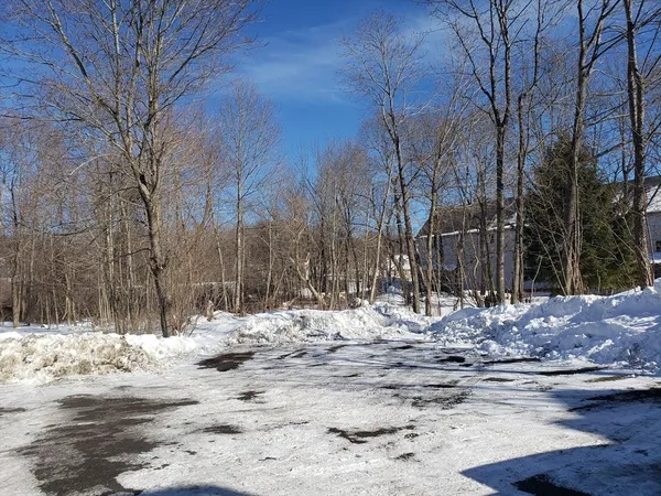 a view of covered with snow on the side of road