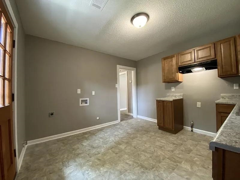 247 Modder Avenue Memphis, TN 38109 - Photo 4 of 8 a view of a room with a barbeque