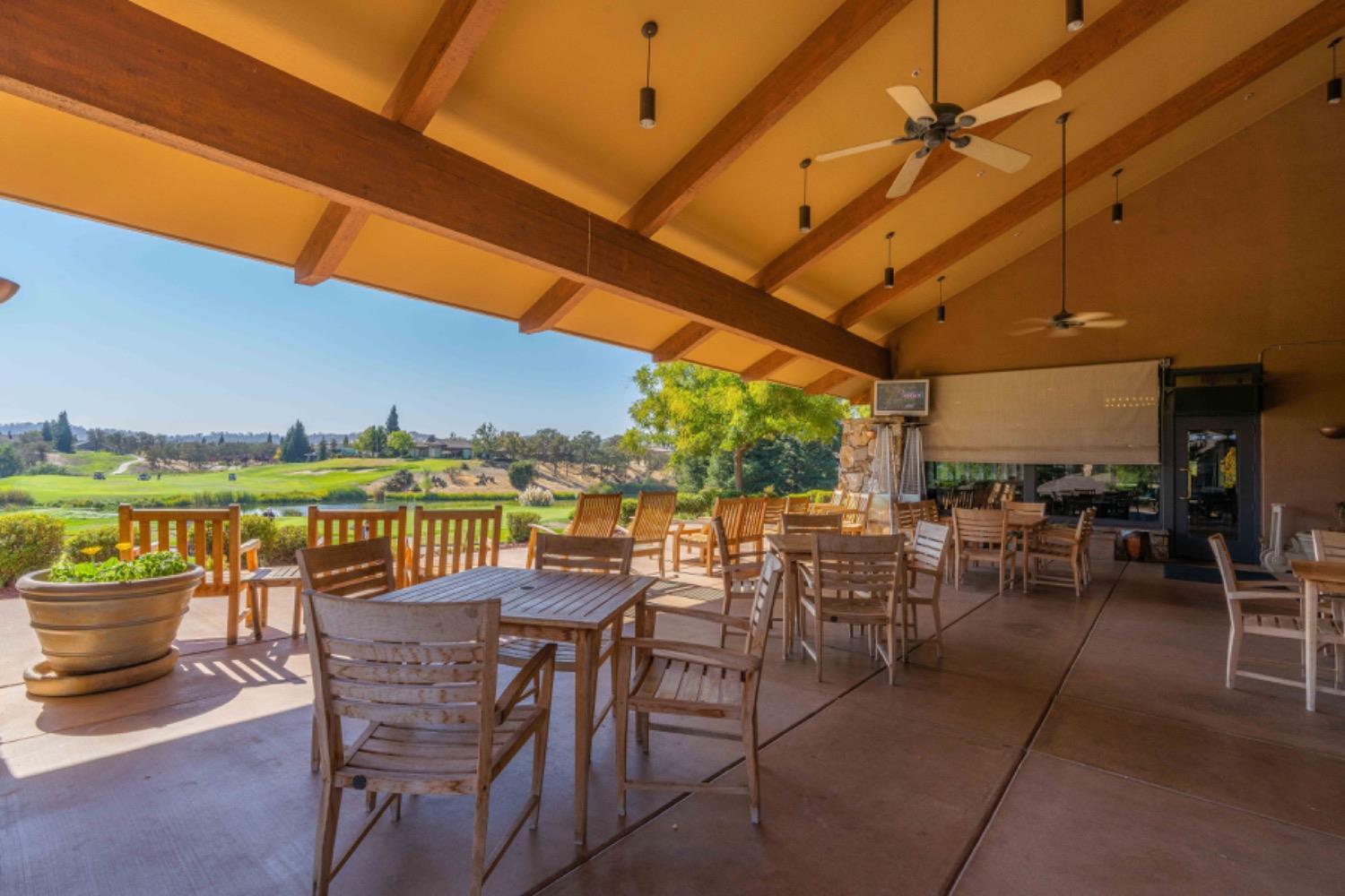 340 Hawk Ridge, Unit 491 Copperopolis, CA 95228 - Photo 15 of 27 a view of a chairs and table in patio