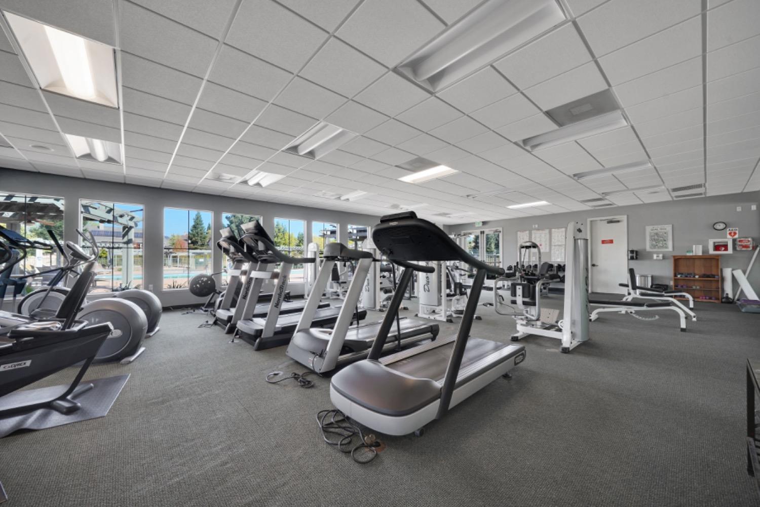 340 Hawk Ridge, Unit 491 Copperopolis, CA 95228 - Photo 21 of 27 a view of a room with gym equipment