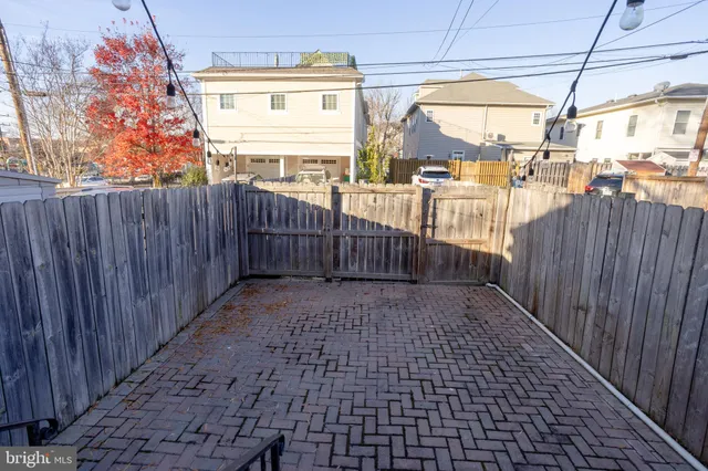 a view of a porch with wooden floor