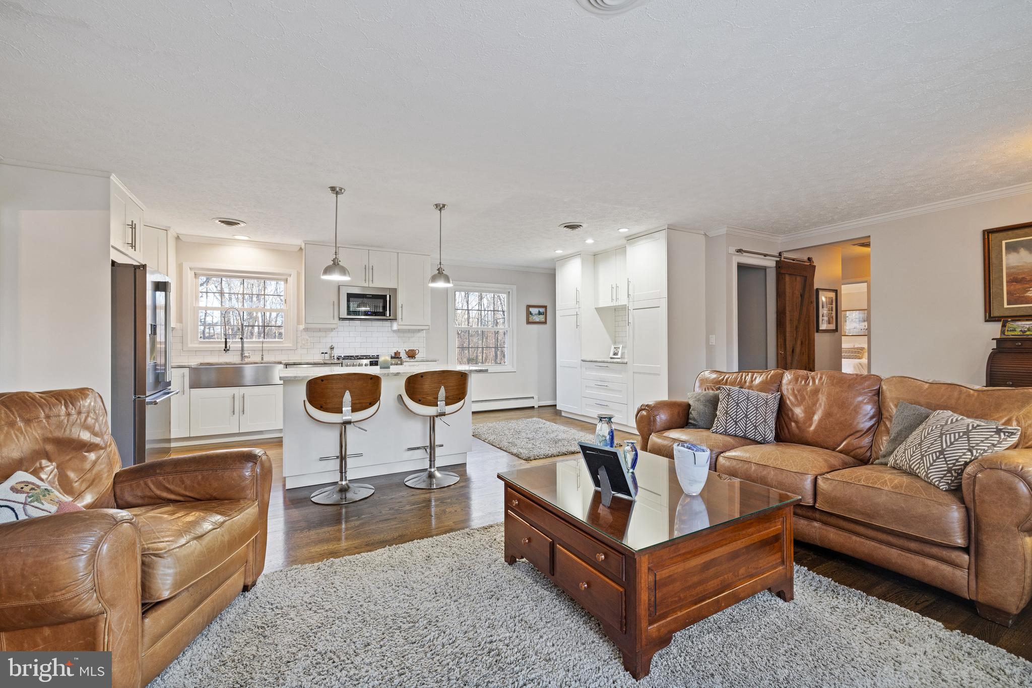 6159 Fishers Station Road Lothian, MD 20711 - Photo 8 of 26 a living room with furniture and a table